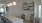 a kitchen with a table and chairs
