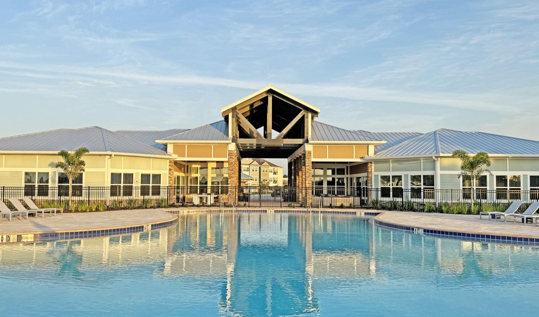 a building with a pool in front