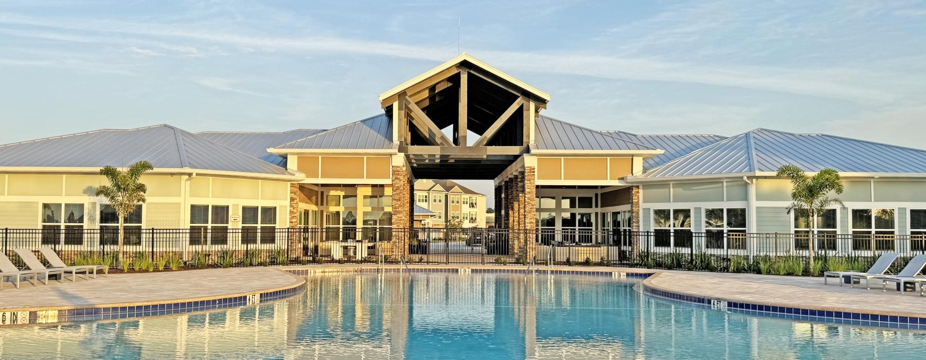 a building with a pool in front
