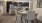 a kitchen with a dining table and chairs