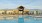 a building with a pool in front