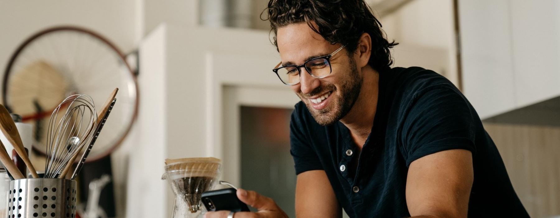 a man holding a phone