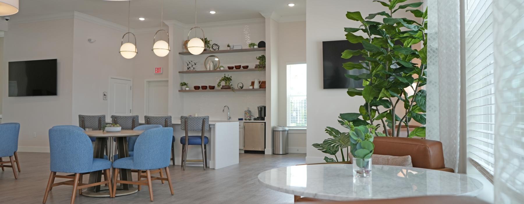 a room with a table and chairs